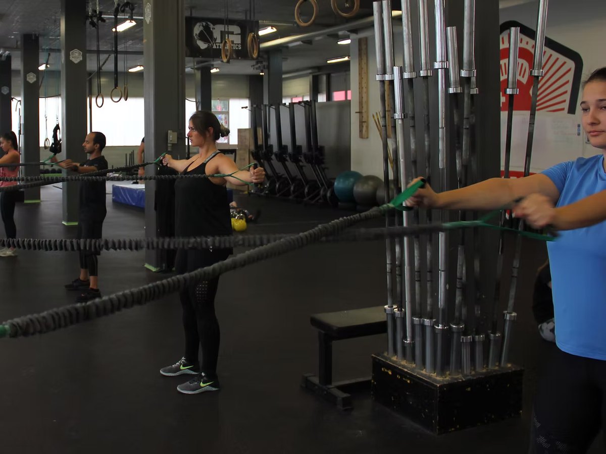 Band work for shoulder strength and mobility at 1352 Athletics